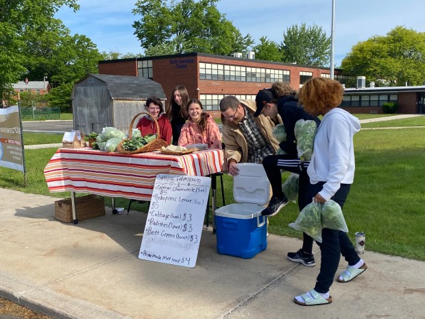Joshua Stephens, and his students operate the second farm stand of the year at Memorial Options Center in Euclid. (Frank Mecham- The News-Herald)