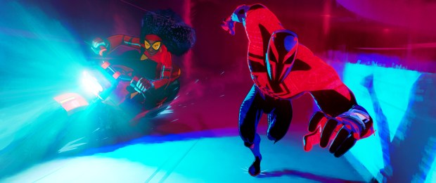 Jessica Drew (Issa Rae) and Miguel O'Hara (Oscar Isaac) race into action in "Spider-Man: Across the Spider-Verse." (Courtesy of Sony Pictures Animation)